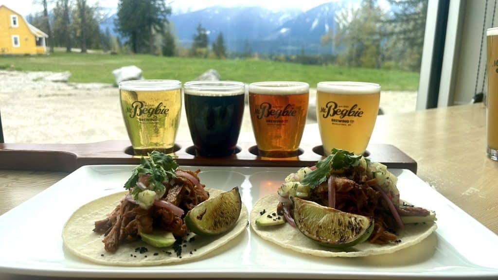 Mt. Begbie Brewery fleet of four beers and two opened tacos.