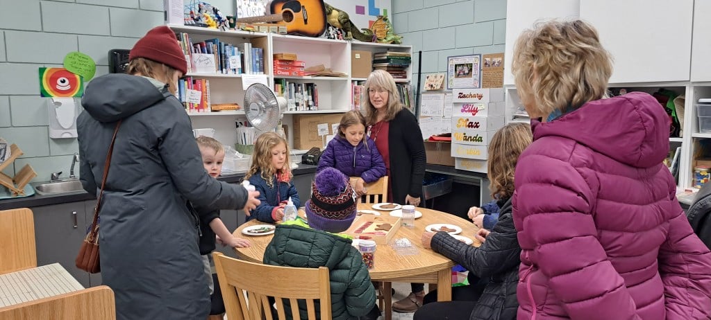 Lucie Bergeron, community librarian with guests at the Revelstoke library patron appreciation day.