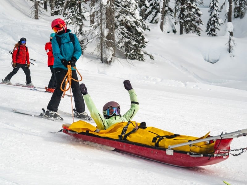 She Patrol 2025 participants in sled rescue demo