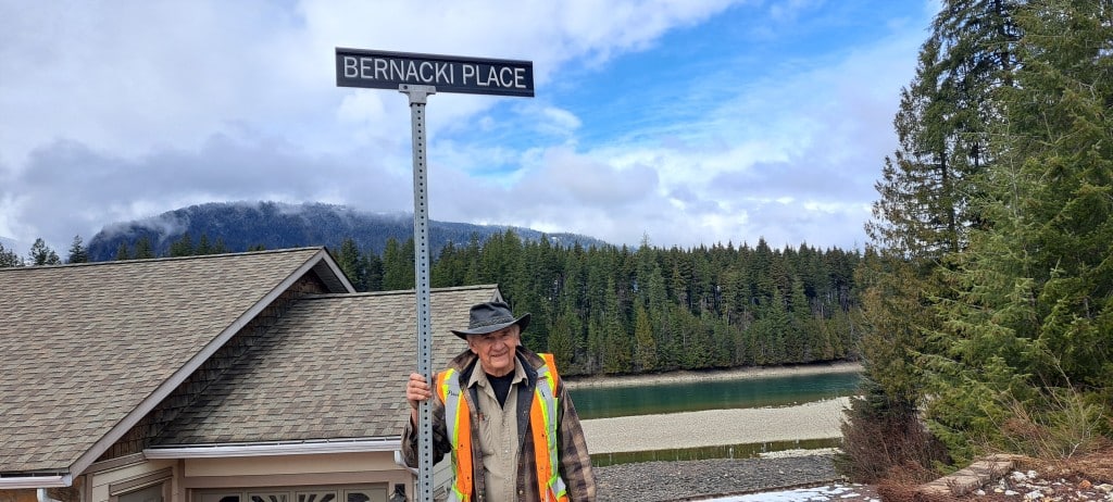 Peter Bernacki under street sign that says Bernacki Place