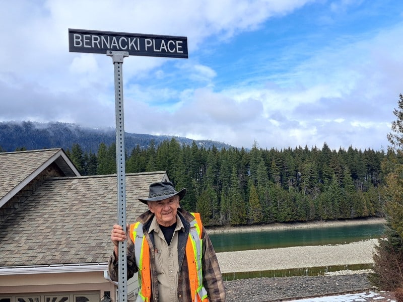 Peter Bernacki under street sign that says Bernacki Place
