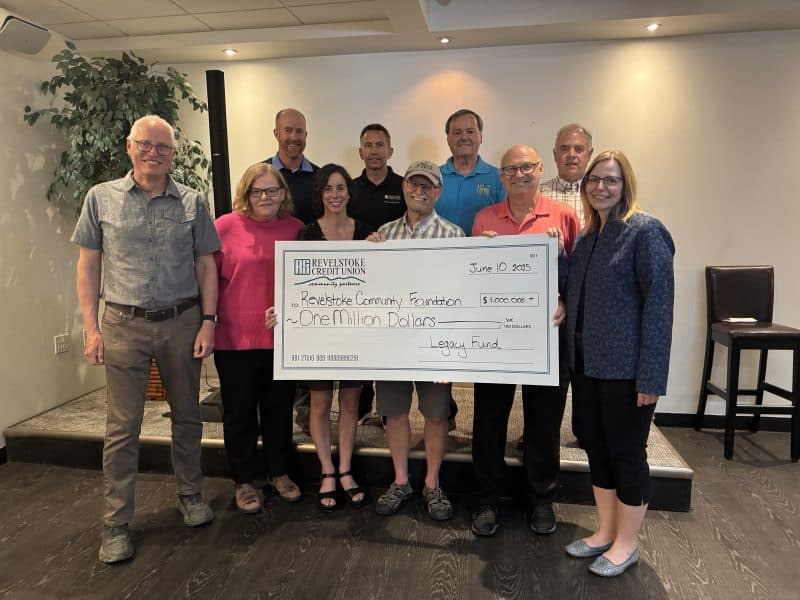 Revelstoke Credit Union Board of Directors with Revelstoke Community Foundation presenting a cheque as part of the Cascadia Credit Union merger.
