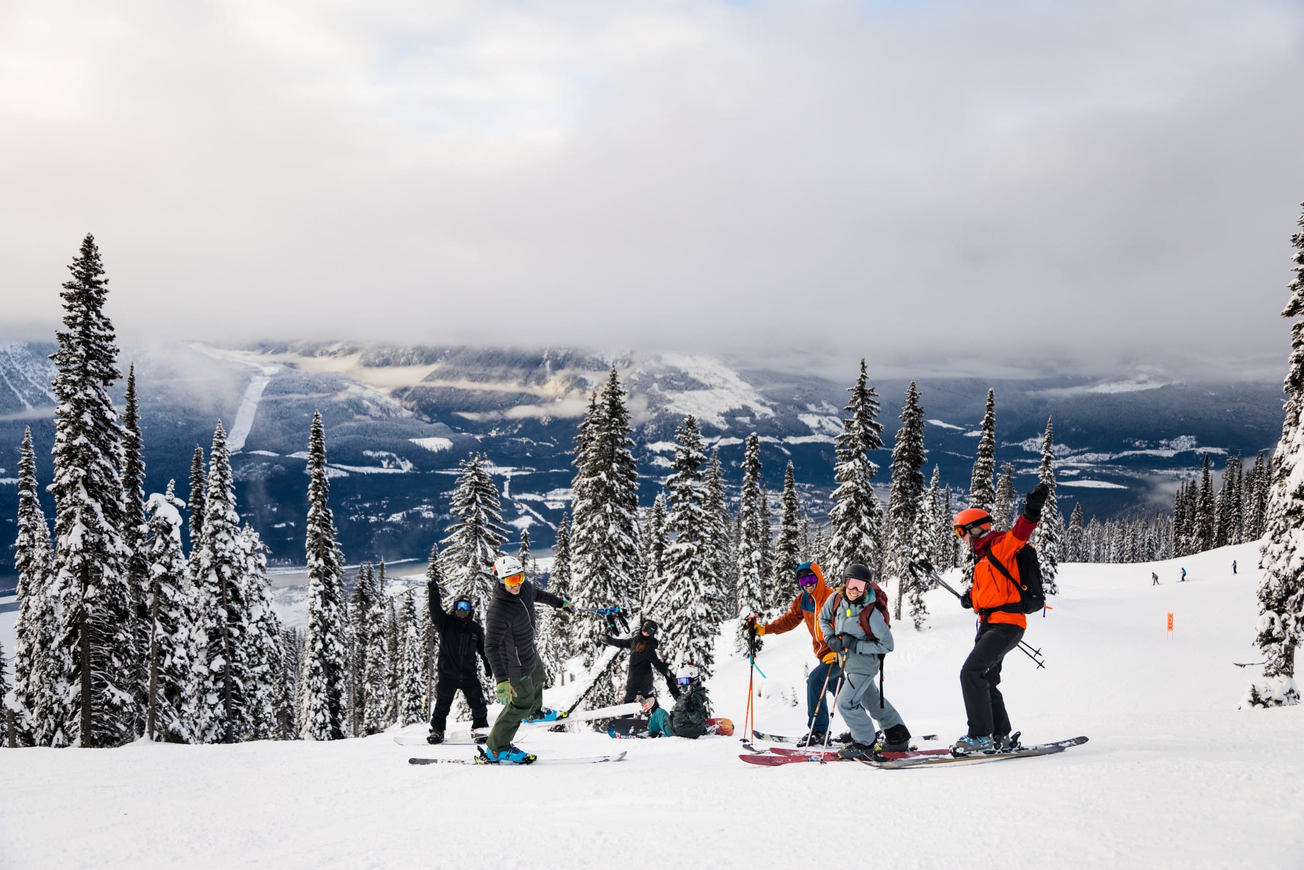 Split//Ski festival attendees in skis and snowboards at Revelstoke Mountain Resort get ready to ride the trails.