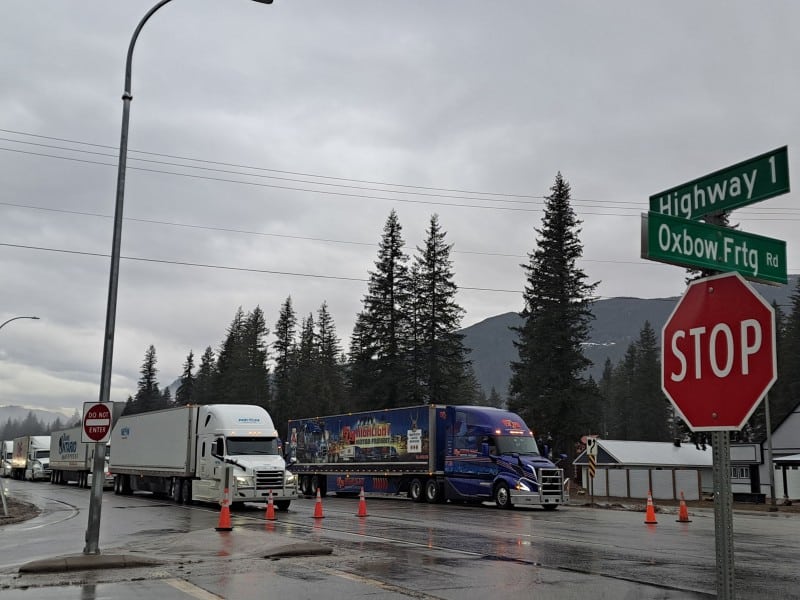 Semi and commercial trucks lined up on the Trans Canada Highway in Malakwa, image for the Revelstoke highway closure story
