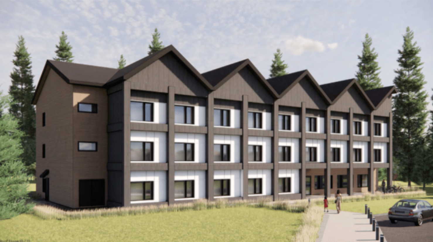 Computer generated image of Revelstoke Community Housing Society Oscar Lands proposed modular build, a three-story building with rows of windows