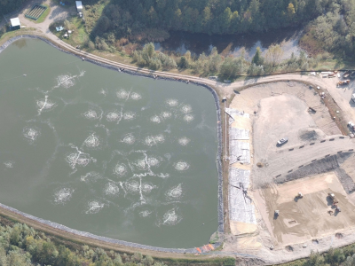 An ariel view of the Revelstoke wastewater treatment plant lagoons, one of them filled and one empty and under construction. Having all waste water in one lagoon has increased the Southside stink