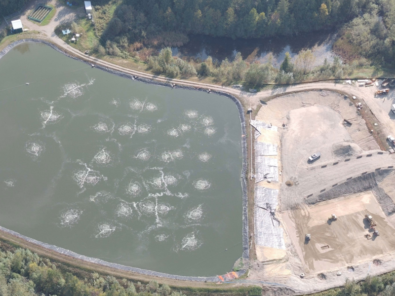 An ariel view of the Revelstoke wastewater treatment plant lagoons, one of them filled and one empty and under construction. Having all waste water in one lagoon has increased the Southside stink